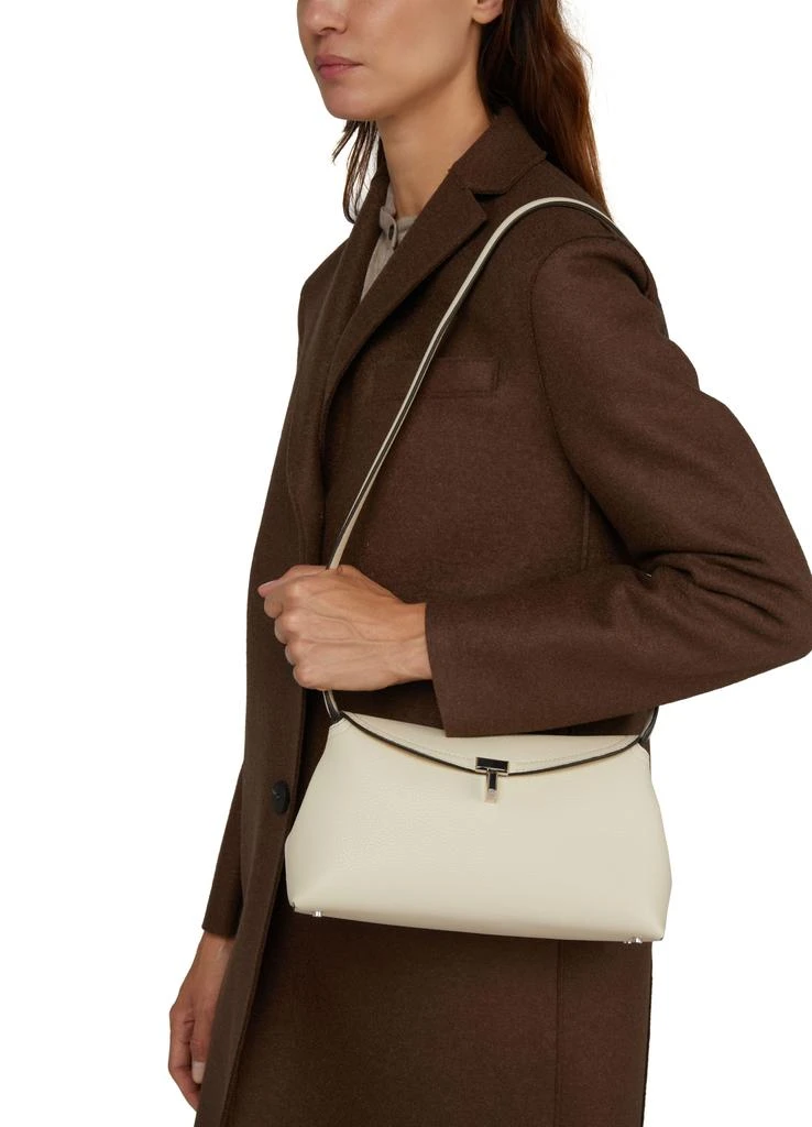 Totême T-Lock leather clutch bag 8
