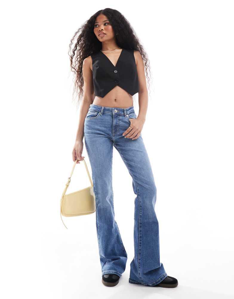 Bershka Bershka Petite high waisted flared jeans in light wash blue