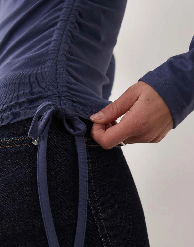 ASOS ASOS DESIGN ruched detail tie side high neck long sleeve top in navy 4