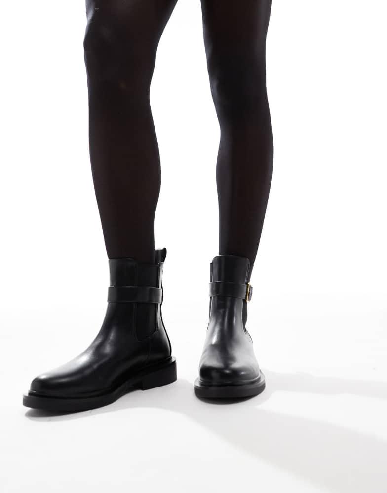 ASOS ASOS DESIGN Wide Fit Aurora flat boots with buckle strap in black