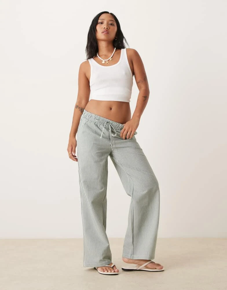 JDY Petite seersucker trousers in green stripes – On Sale Now with