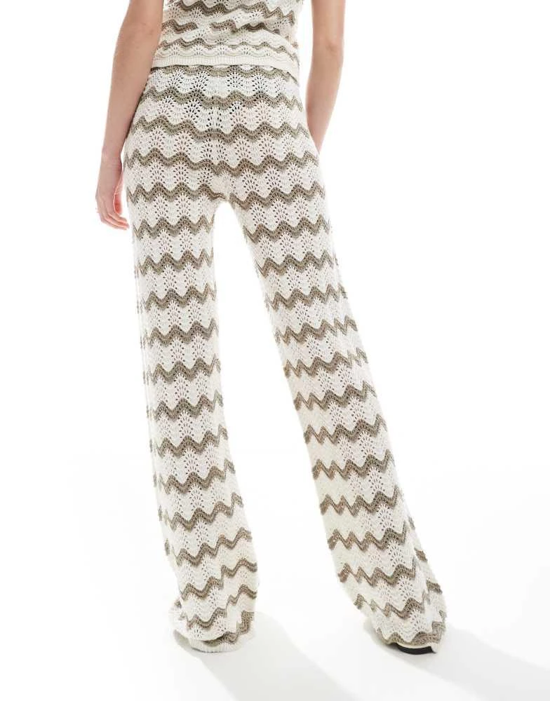 4th 
Reckless 4th 
Reckless wide leg crochet beach trouser co-ord in mocha and cream wave 4