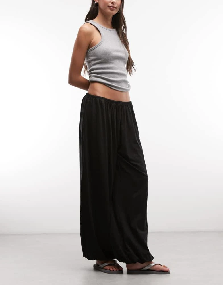 Weekday Weekday balloon fit trousers in black 2