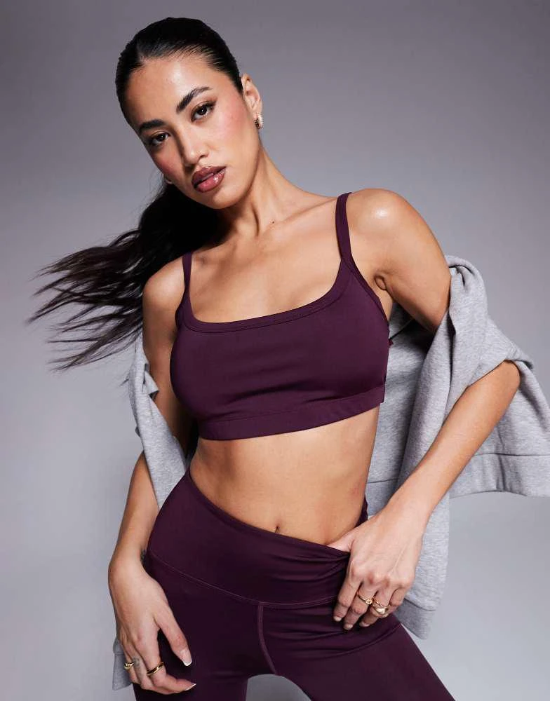 ASOS 4505 active medium support sports bra with removable padding in burgundy 1
