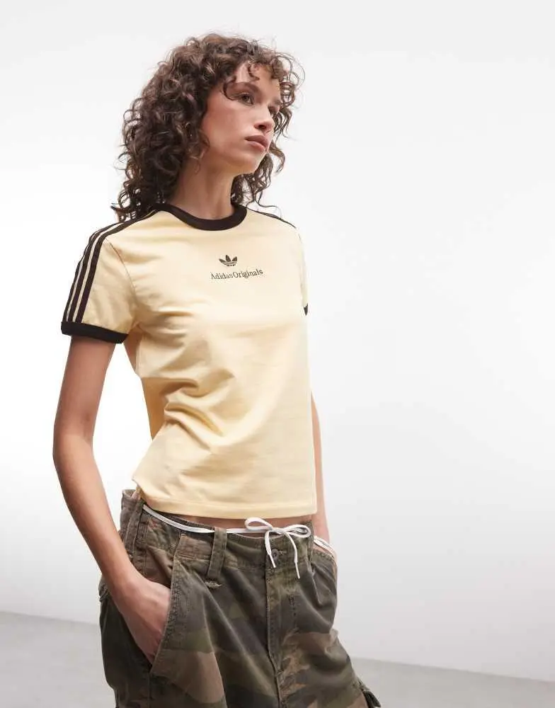 Adidas adidas Originals three stripe t-shirt with central retro logo in light yellow 3