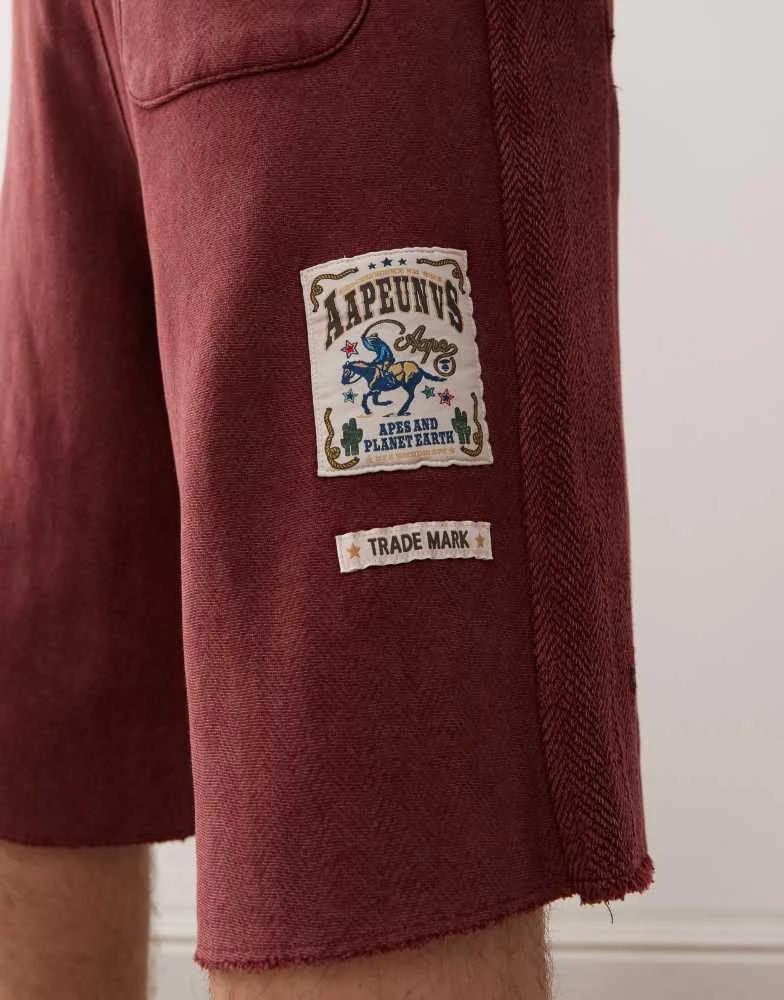 AAPE Aape by A Bathing Ape loose fit heavyweight knitted shorts in dark burgundy with embroidered side stripe 4