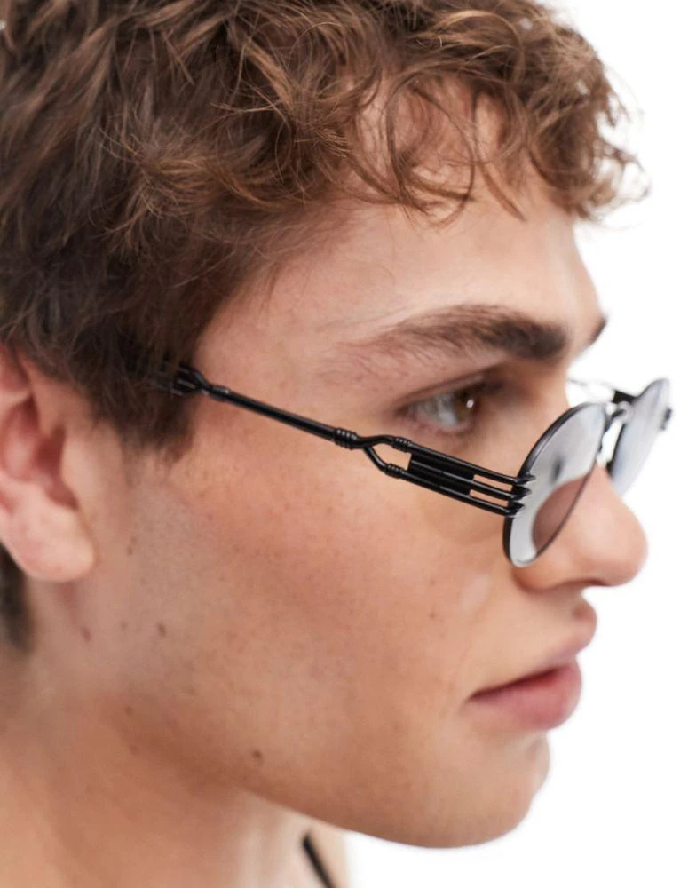 ASOS ASOS DESIGN 90's oval sunglasses with arm detail in black 4