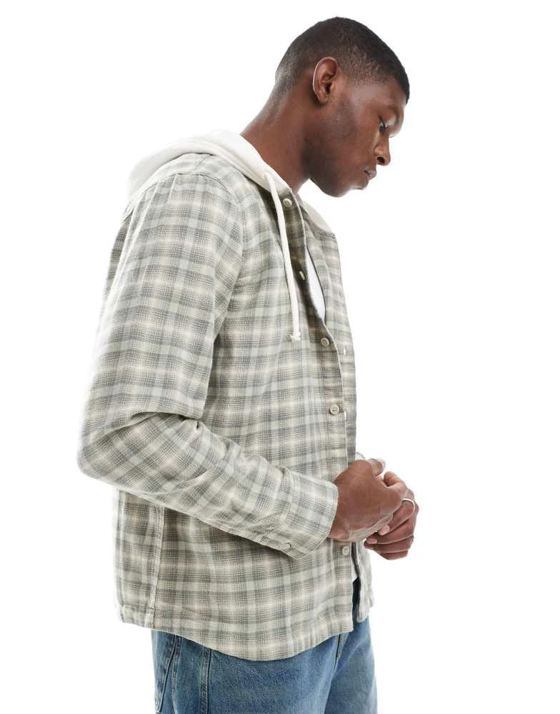 Shop Hollister long sleeve hooded flannel shirt in green check on