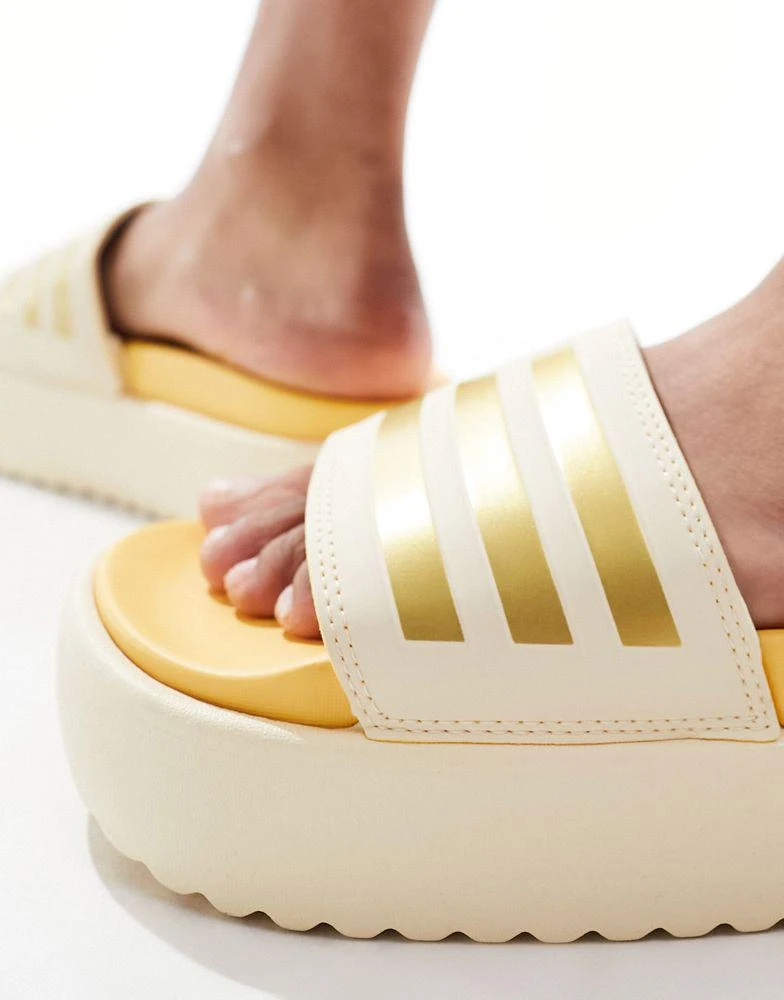 Adidas adidas Training Adilette platform sliders in sand and gold 4