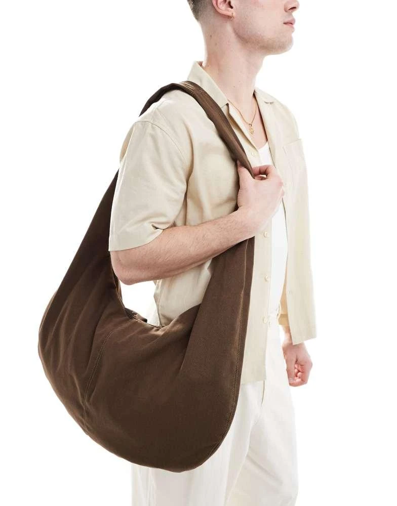 ASOS ASOS DESIGN canvas sling cross body bag in brown 4