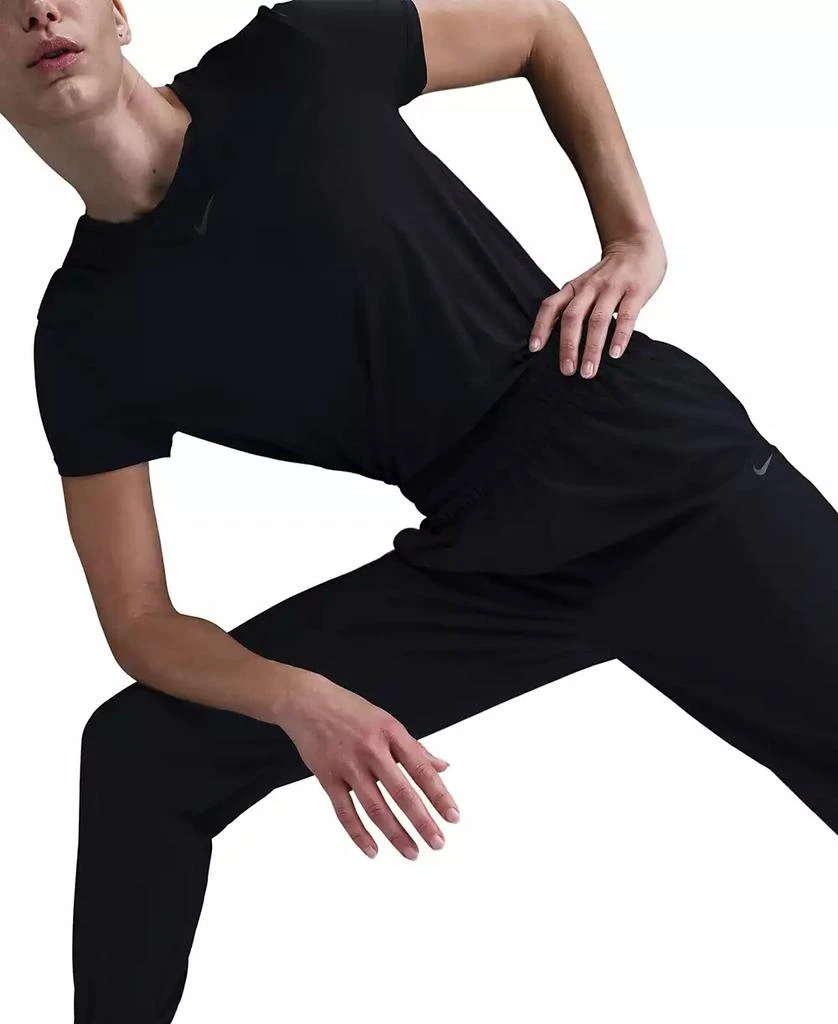 NIKE One Women's Dri-FIT Woven High-Rise 7/8 Joggers 6