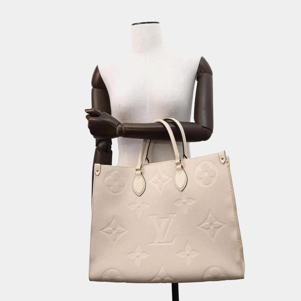 Louis Vuitton Louis Vuitton beige Monogram Empreinte On The Go GM Tote Bag