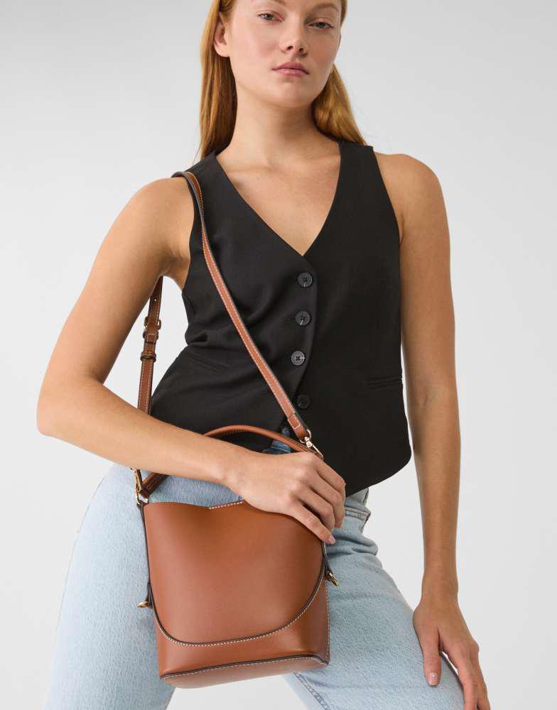 Stradivarius Stradivarius mini bucket bag with strap in pale camel
