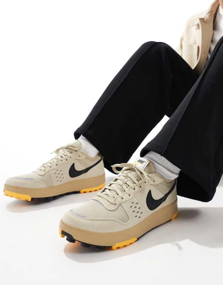 Shop Nike C1ty trainers in light khaki on Sale at