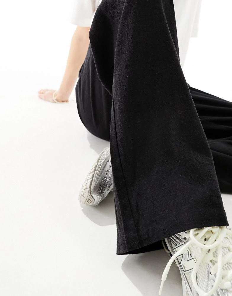 ASOS ASOS DESIGN Tall tailored high waist seam detail wide leg linen trousers in black 4