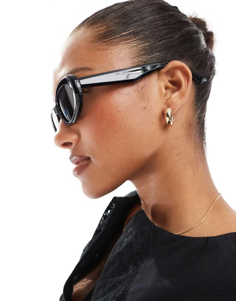 ASOS ASOS DESIGN oval sunglasses in shiny black 2