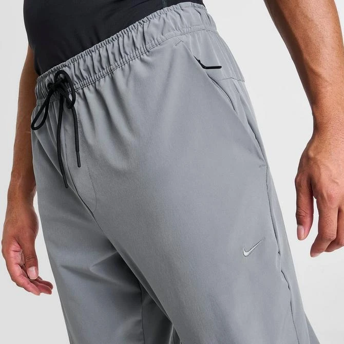 NIKE Men's Nike Dri-FIT Unlimited Tapered Leg Versatile Training Pants 9