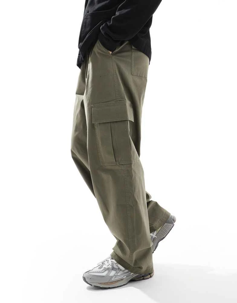 ASOS ASOS DESIGN super baggy cargo trousers with elasticated waist in washed green 4