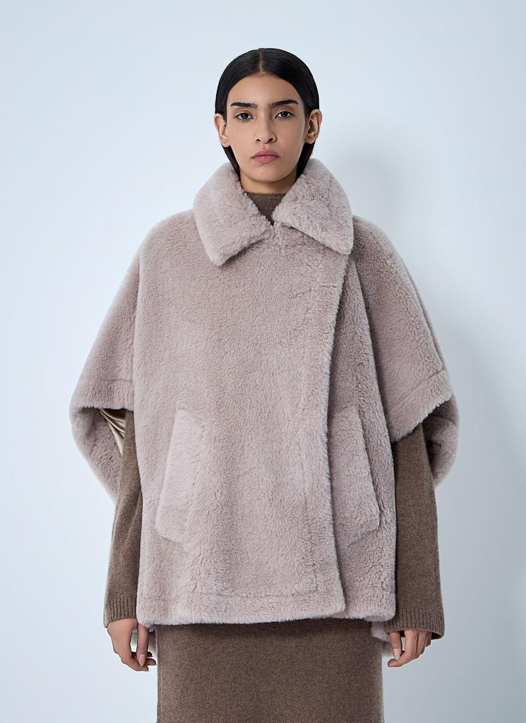 Shop Frine Poncho In Black Jacquard Virgin Wool on Sale at Shop Frine Poncho In Black Jacquard Virgin Wool on Sale at