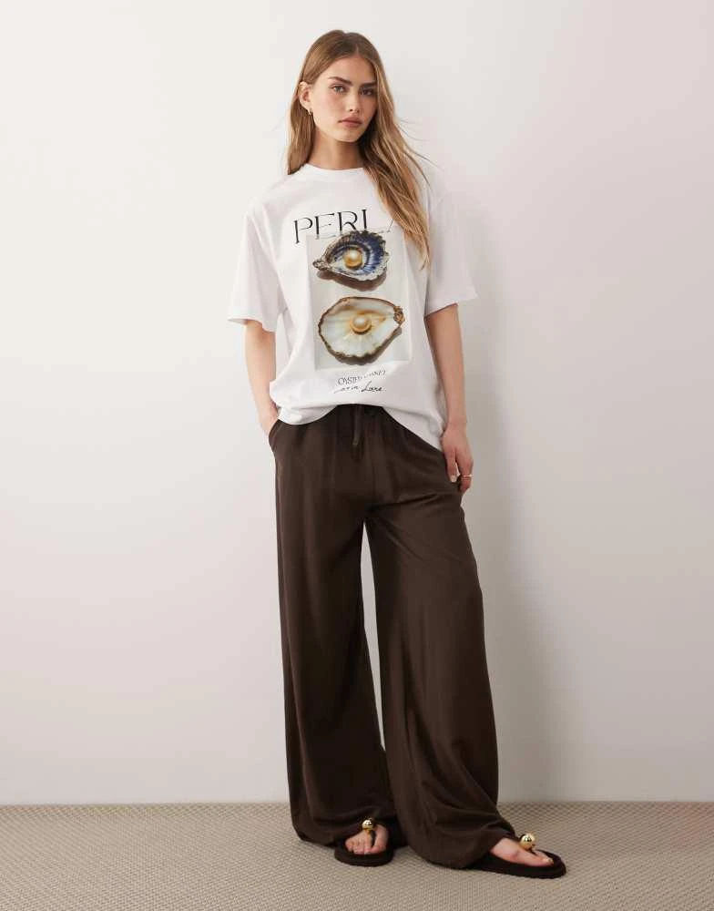 ASOS ASOS DESIGN short sleeve oversized top with oyster graphic in white 3