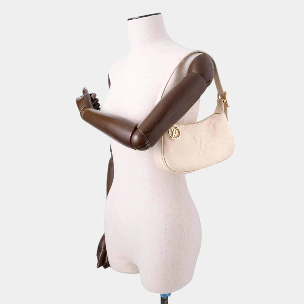 Louis Vuitton Louis Vuitton mini moon claim Monogram Empreinte Leather 8