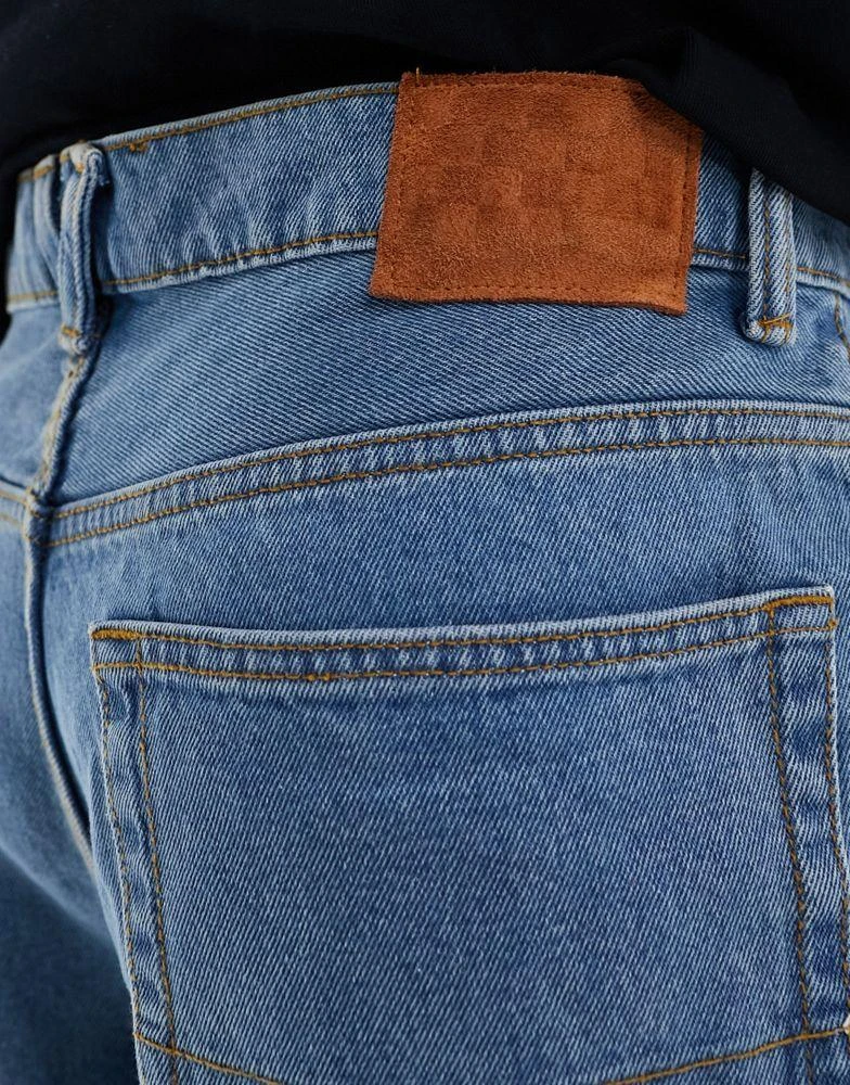 Vans Vans check-5 baggy denim jeans in mid-blue wash 5