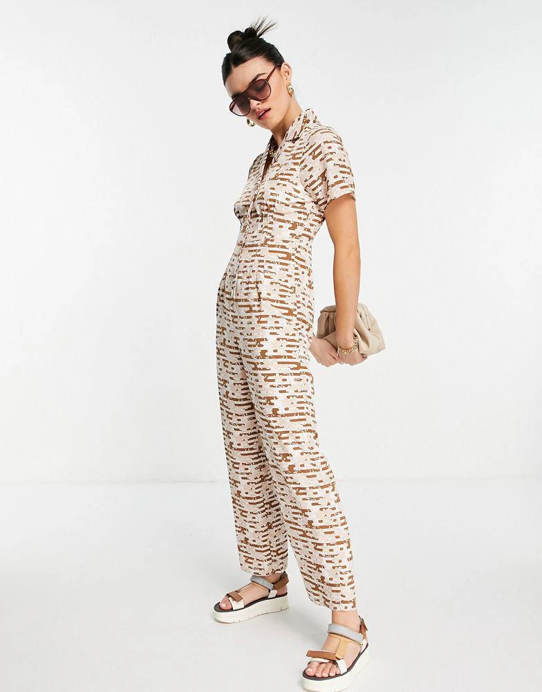 Fashion Union Fashion Union button through jumpsuit with waist detail in retro floral 1