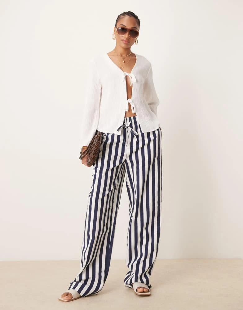 ASOS ASOS DESIGN Tall linen look pull on trouser in navy stripe 1