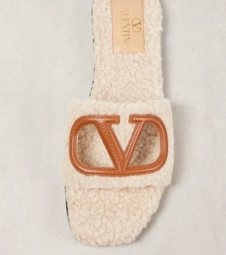 Valentino VLogo cutout slides 5