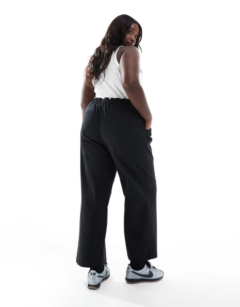 ASOS ASOS DESIGN Curve exaggerated pull on wide leg trouser in washed black 5