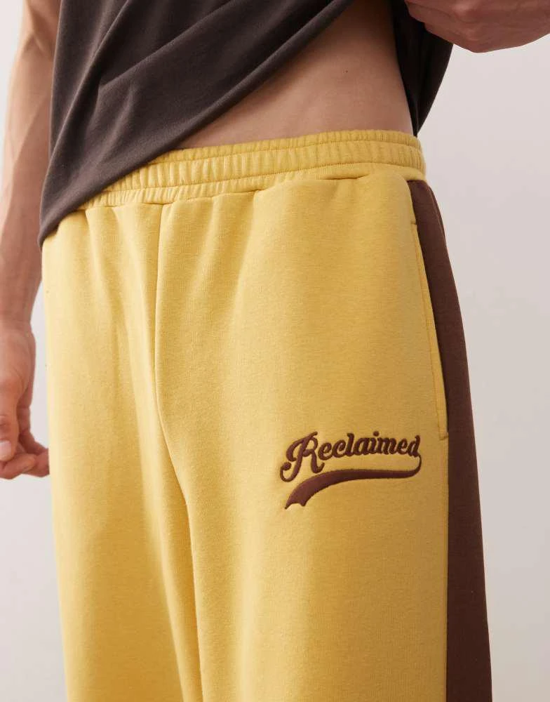 Reclaimed Vintage Reclaimed Vintage heavyweight wide leg jogger in mustard with brown side stripe 5
