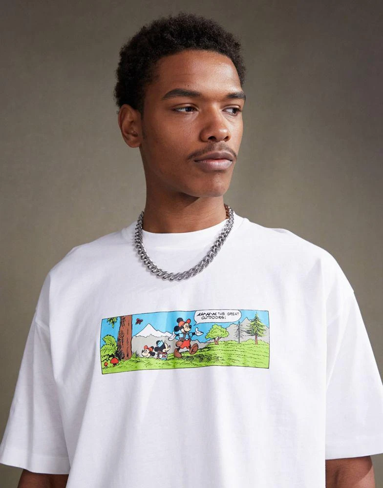 ASOS ASOS DESIGN Disney unisex oversized t-shirt with Mickey Mouse comic strip prints in off white 4