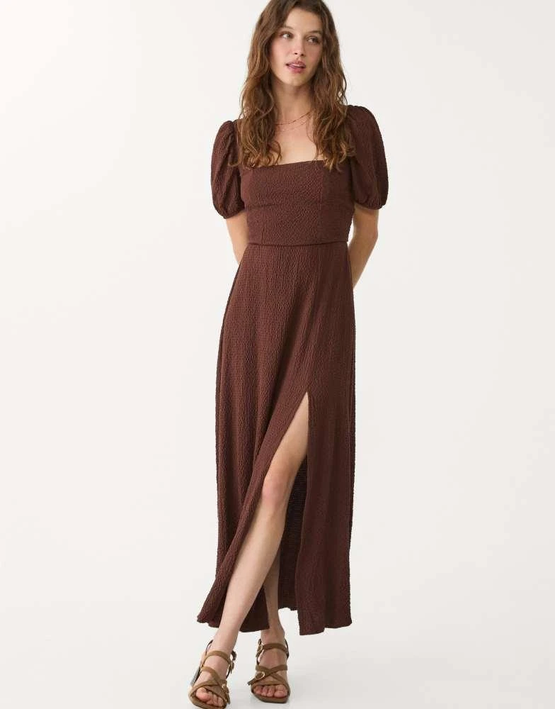 Stradivarius Stradivarius textured milkmaid maxi dress with cross back in  brown - Dresses & Skirts - Compare Prices from 3+ Stores - BeyondStyle