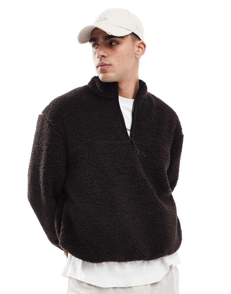 ASOS ASOS DESIGN boxy oversized quarter zip borg sweatshirt in brown 1
