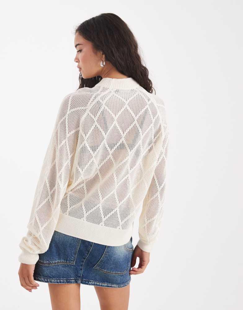 Shop Fred Perry argyle mesh knitted jumper in white on Sale at