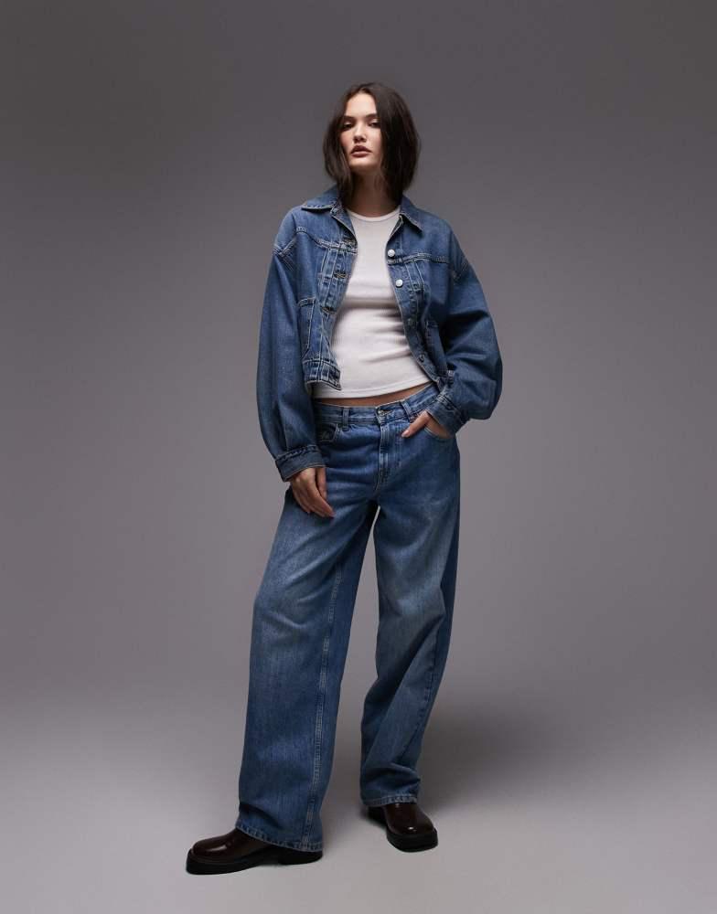 Shop Levi's balloon sleeve denim trucker jacket in blue on Sale at