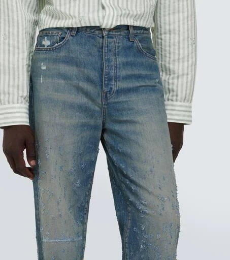 AMIRI Shotgun distressed wide-leg jeans 5