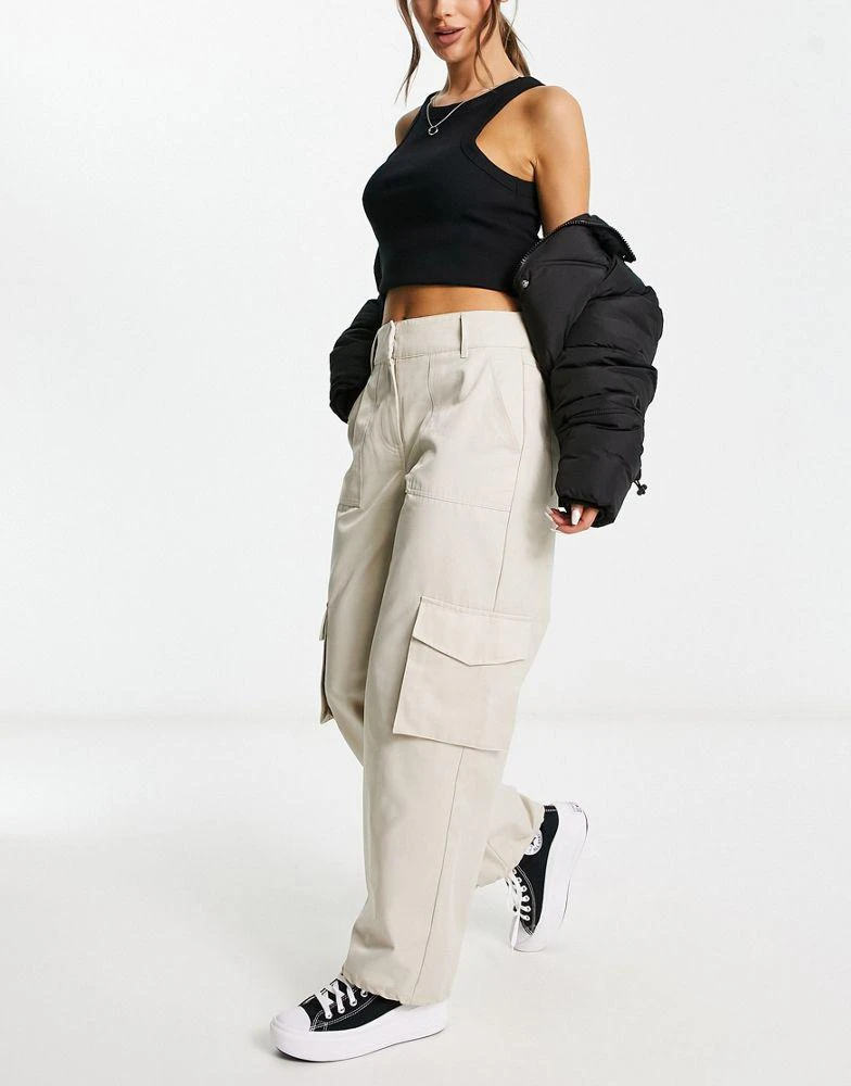 Something New Something New X Naomi Anwer cargo trousers in cream 1