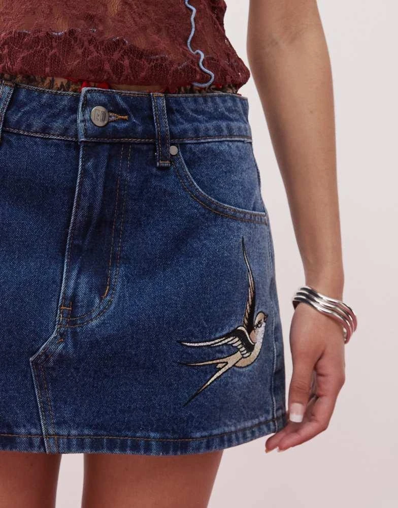 Ed Hardy Ed Hardy swallow side wash low rise denim mini skirt in washed indigo 4