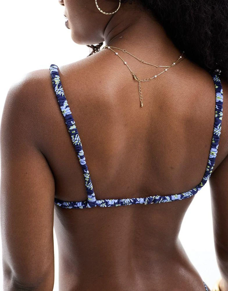 Stradivarius Stradivarius ruched detail bikini top in blue floral print 4