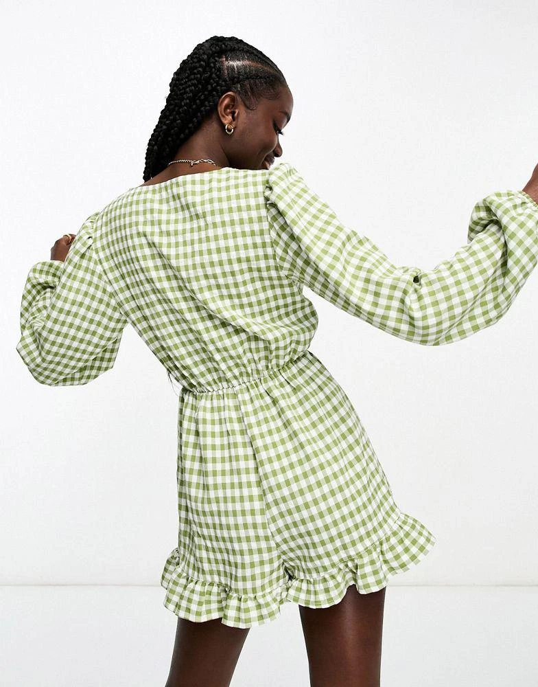 Miss Selfridge Miss Selfridge long sleeve tie front playsuit in khaki gingham 2
