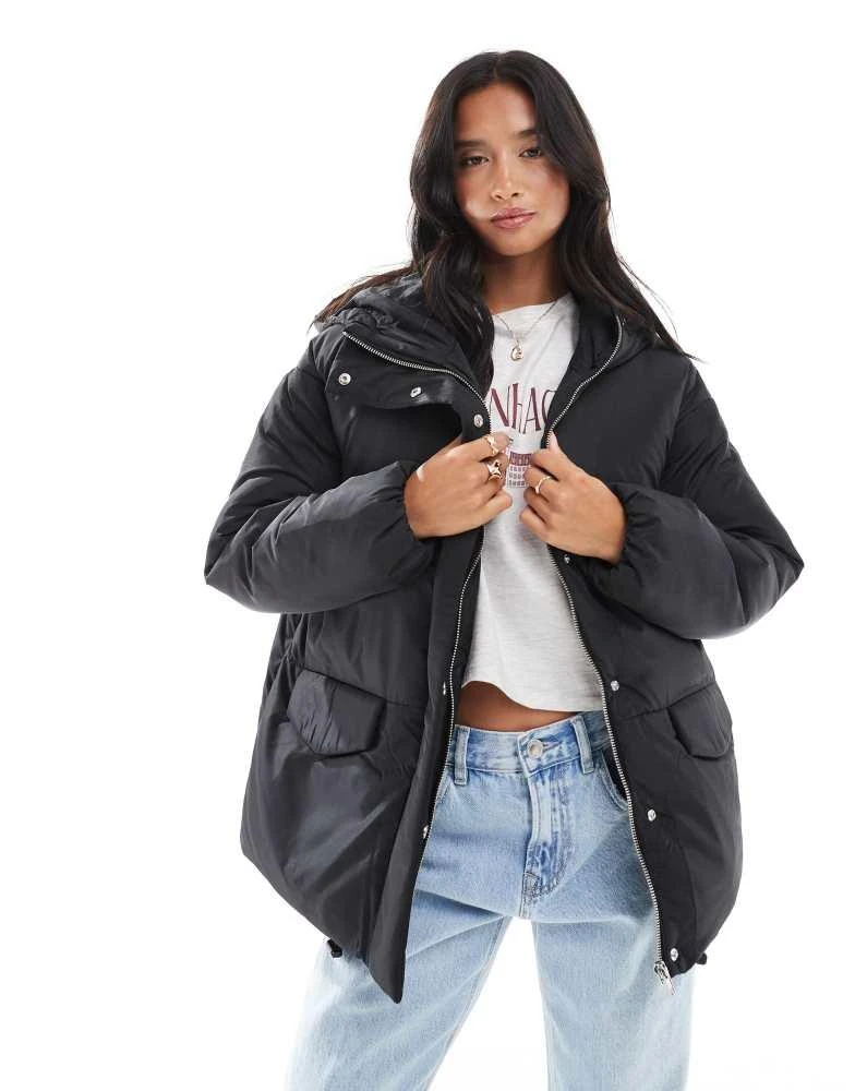 ASOS ASOS DESIGN Petite oversized puffer jacket with hood in black 4