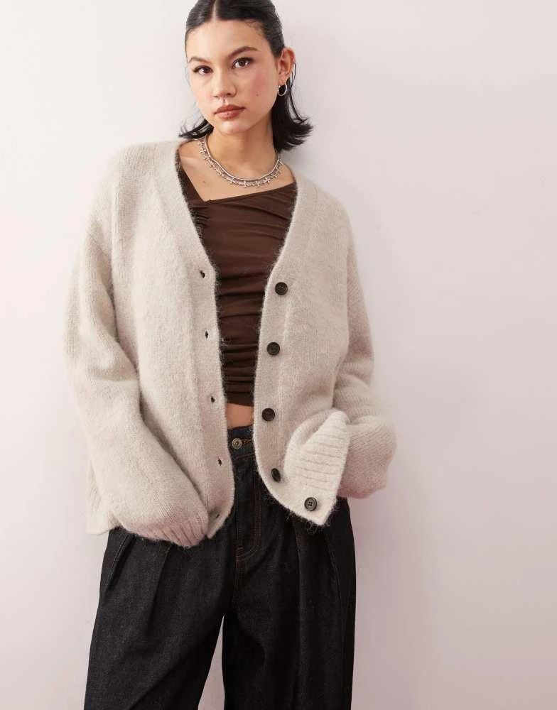 Weekday Weekday Emira fluffy knit slouchy cardigan in beige melange 1