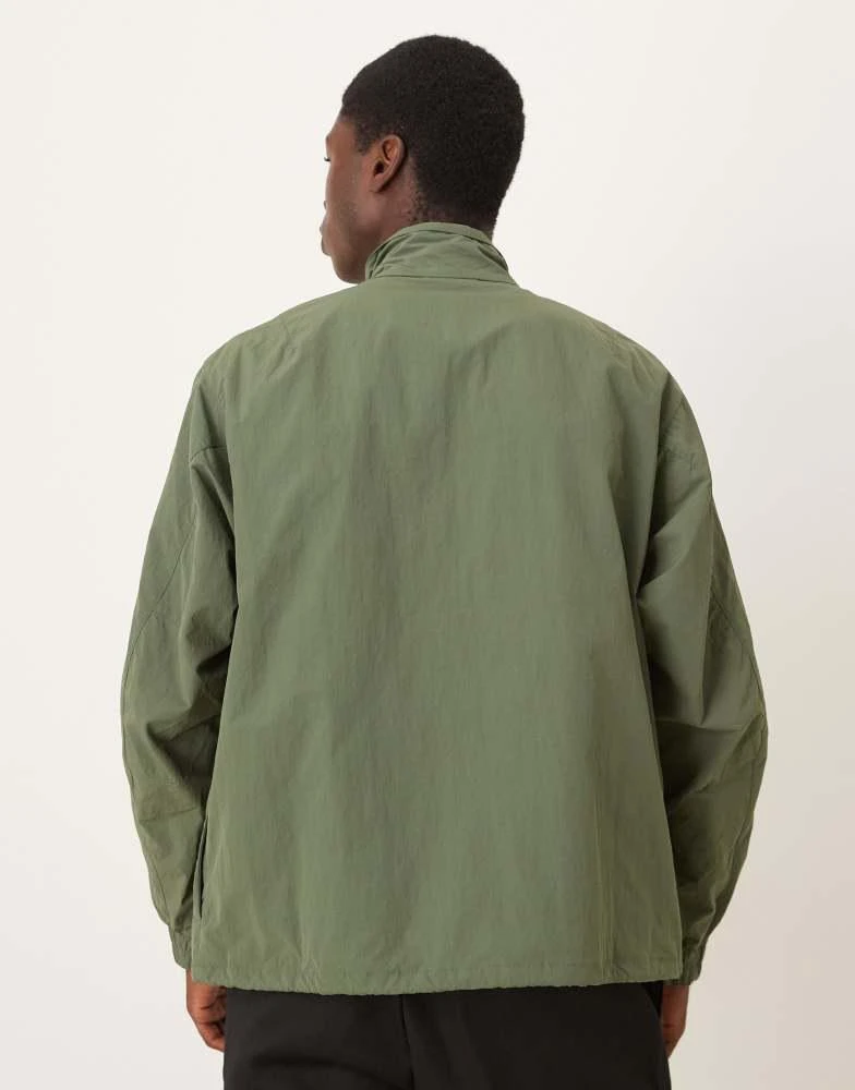 Barbour Barbour short showerproof jacket in green 3