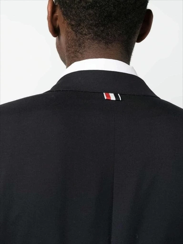 Thom Browne Sleek Tailored Suit Jacket with Notch Lapel and Metallic Buttons 5