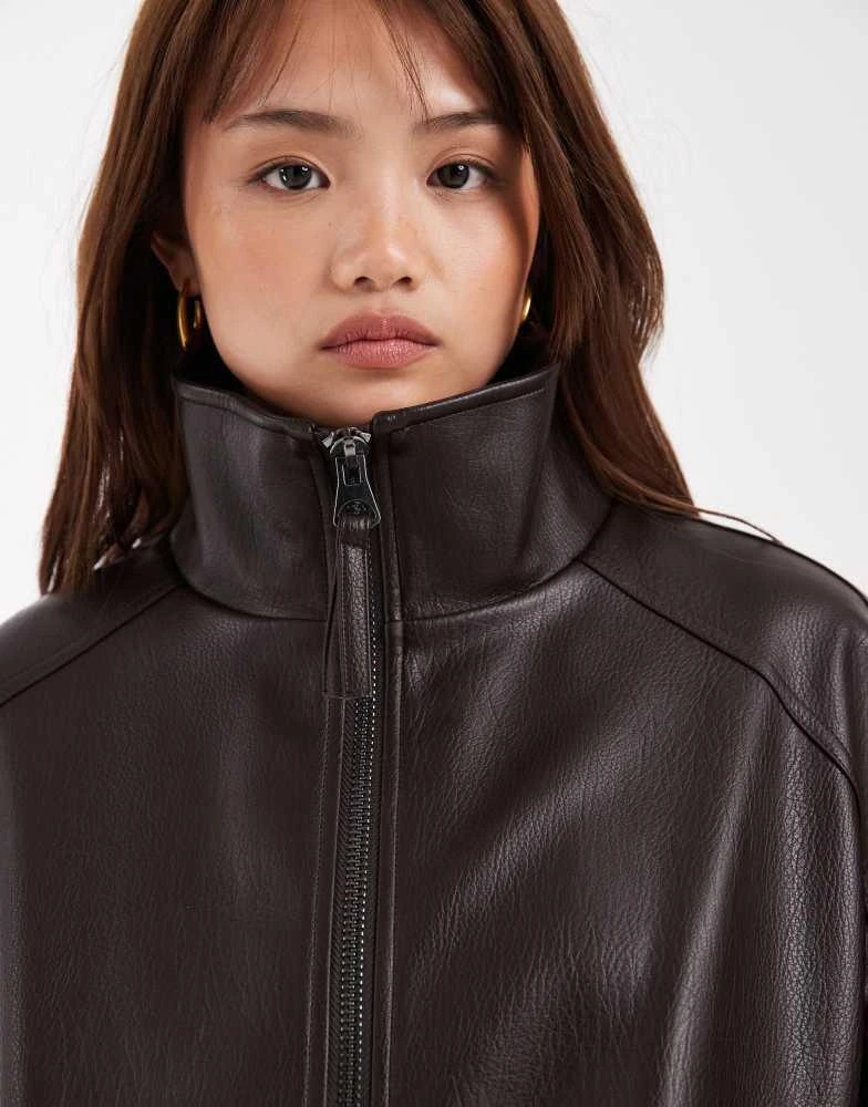 ASOS ASOS DESIGN Petite oversized leather look funnel bomber jacket in chocolate 2