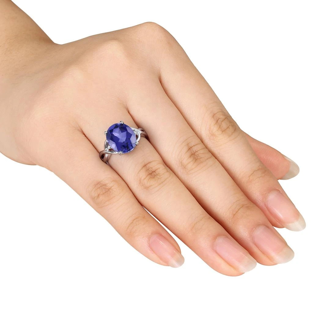 Mimi
Max 7 1/2ct TGW Oval-Cut Created Blue Sapphire and Diamond Accent Ring in Sterling Silver 2