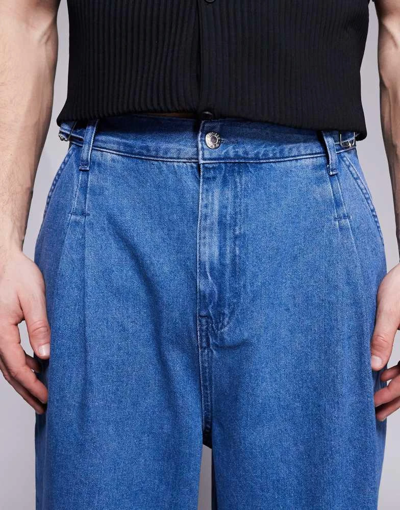 ASOS ASOS DESIGN oversized baggy jeans with side belts in mid wash blue 3