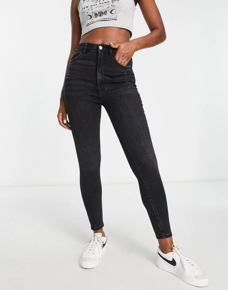 Stradivarius Stradivarius super high waist skinny jeans in washed black 1
