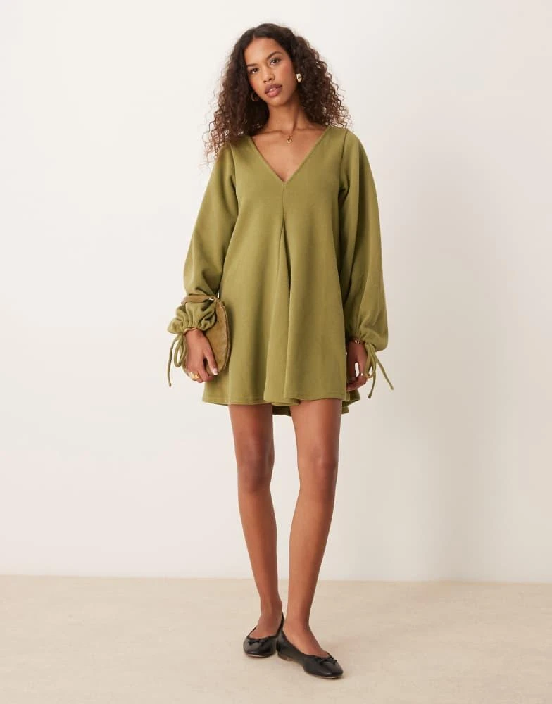 ASOS ASOS DESIGN supersoft v-neck flare hem skirt mini dress with tie sleeve in olive 1